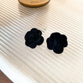 Detail of black flocked camellia earrings with retro texture on ribbed glass tray - Silver Earring Post-Black