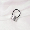 Detailed macro view of a silver matte metal buckle on a black elastic minimalist hair tie - Matte Curved (2) / Silver