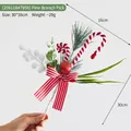 Artificial Christmas pine branch with candy cane, berries and bow for festive decor - (20611847956) Festival Mix Pine Branch
