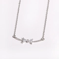 Detail of silver bow pendant with cubic zirconia on a delicate stainless steel chain - Style 4 White Gold (White Zirconia)