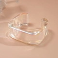 Iridescent acrylic geometric bangle with Aurora effect showing a chunky C-shaped open design - Square