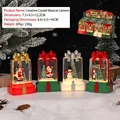 Christmas musical snow globe lantern with Santa and Snowman in a warm festive scene - Bow Knot Gift Box Shape Music Light (2458)