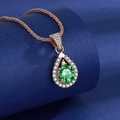 Rose gold teardrop necklace featuring a circular green gemstone and white crystal accents - 3-carat Champagne Gold And Green Diamond Necklace Xl-52 [with Starry Chain]