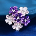 Elegant purple enamel flower brooch with sparkling rhinestone centers on silk background - XD824234-3 Purple White Flower Cluster
