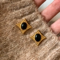 Vintage gold diamond-shaped studs with black oval stone on brown knitted sweater - Gold-Black