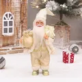 Figurine Père Noël de 30cm en costume crème et doré avec sac de cadeaux chic - Style Luxe Or Champagne