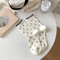 Cream crew socks with brown flower embroidery and ruffle trim in a retro style - One Size / White