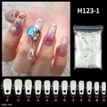 Sizing chart for trapezoid false nails with heart hollow design in 12 different sizes - Transparent (504pcs/Bag)