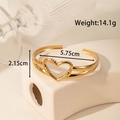 Gold stainless steel hollow heart cuff bracelet featuring elegant polished finish - Hollow Heart