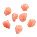 Close-up of translucent peach acrylic irregular beads with high gloss finish for DIY crafts - Irregular 01 / 10 Pieces Pack / Orange