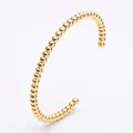 Elegant gold beaded C-shaped cuff bracelet made of polished stainless steel for women - Beaded Bracelet / Gold