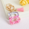 Letter B resin keychain with pink glitter stones and matching suede tassel detail - Letter B / Pink