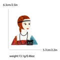 Cartoon acrylic red-haired girl and black cat brooch measuring 6.3cm by 5.7cm - Brown