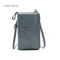 Women's multi-functional crossbody phone bag in light blue faux leather finish - Blue