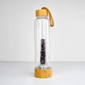 Energy glass water bottle with bamboo lid and interior purple amethyst crystal stones - Purple