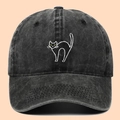 Washed black cotton baseball cap featuring a detailed black cat embroidery design - Black