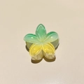 Macro detail of Frangipani hair claw clip with green and yellow gradient and glitter - Colorful Plumeria Yellow Green