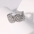 Anillo abierto ajustable de plata con diseño de flor trenzada en acero pulido brillante - Estilo Abierto de Flor Tejida / Color Acero