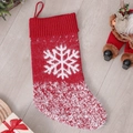 Red knitted Christmas stocking with white snowflake patterns and a hanging loop - Snowflake Style