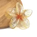 Detailed macro view of an amber resin flower hair claw clip with shiny silver glitter - Glitter Amber Yellow