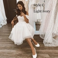 Detail of light ivory polka dot mesh short wedding dress with off-shoulder neckline - Custom Size / Style C Ivory