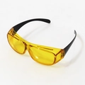 Night vision driving glasses with yellow lenses and black wrap-around frame for eye safety - Transparent Yellow