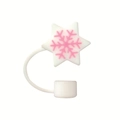 White silicone straw topper featuring a pink snowflake star design for 10mm straws - Snowflake