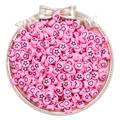 Pink flat round acrylic beads with black heart and star patterns in a decorative tray - Pink Stars Moons Beads
