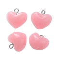 Close-up of pink heart-shaped acrylic pendants with silver metal loops on a white background - Acrylic Pink (10pcs/pack)