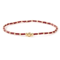 Handmade red and gold beaded bracelet with minimalist round metal beads on white background - Red