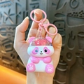Cute pink and white panda keychain charm featuring a transparent heart dome for bag decoration - Pink