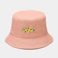 Close-up of sunflower embroidery on peach canvas fisherman hat with reinforced brim stitching - Pink