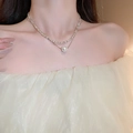 Gros plan d'un collier double épaisseur en argent avec perle unique et chaîne à facettes - Chaîne de Clavicule en Perles Double Couche Argentée / 43# Collier-Argent