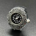 Silver quartz finger ring watch with black dial and vintage floral texture on band - Black
