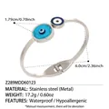 Brazalete abierto de acero inoxidable plateado con dijes de ojo turco y piedra azul - Estilo Turquesa Mal de Ojo Acero (Z289) / Color Acero