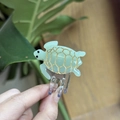 Green tortoise-shaped acetate hair claw clip with golden shell patterns for ponytail styling - Sage Green - Small (Approx. 4.5cm)