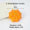 Realistic orange PVC cream cookie keychain accessory with star shape and matte texture - Small Cream Cookie Model