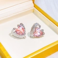 Elegant heart-shaped pink zircon stud earrings in a silver-tone setting shown in a box - E2937 Silver Sweet Pink Heart Stud Earrings