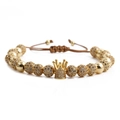 Pulsera de cuentas doradas con corona central y cordón trenzado marrón ajustable - Estilo Ajustable de Corona con Cuentas / Pulsera de corona dorada
