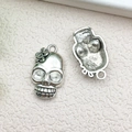 Vintage silver skull pendant with flower detail for DIY jewelry making and crafts - Halloween Skull with Flower 13x21mm