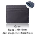 Slim dark grey RFID blocking card holder in pebbled leather with 4 card slots - 102x82mm / RFID 4 Slots / Gray