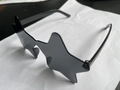 Chic black star-shaped rimless sunglasses for parties with slim black temples - Black
