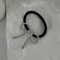 Silver twisted rope metal bow hair tie with black elastic band on textured background - Twisted Rope Bow / 0599-Silver