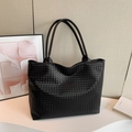 Minimalist black woven oversized hobo bag with braided PU leather texture and soft handles - Black