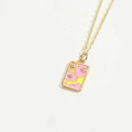 Macro shot of rectangular pink floral pendant with yellow base and sparkling zircons - Pink Square Flower / Gold