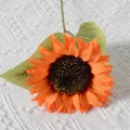 Artificial orange sunflower with realistic petals and green leaves on white knit background - New Style Sunflower (Orange)