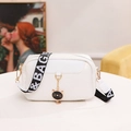White crossbody shell bag with woven texture, wide logo strap and cat pendant - White