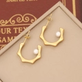 Macro detail of golden bamboo-style C-hoop earrings with pearl inlay on jewelry box - Bamboo C-Shape Inset Pearl Style (6#)
