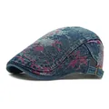 Vintage blue denim flat cap featuring pink and grey artistic floral patterns with side buckle - Adjustable / Dark Blue