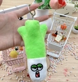 Close-up of cute scallion plush keychain with embroidered face and silver metal ring - Mixed Leek + Silver Buckle